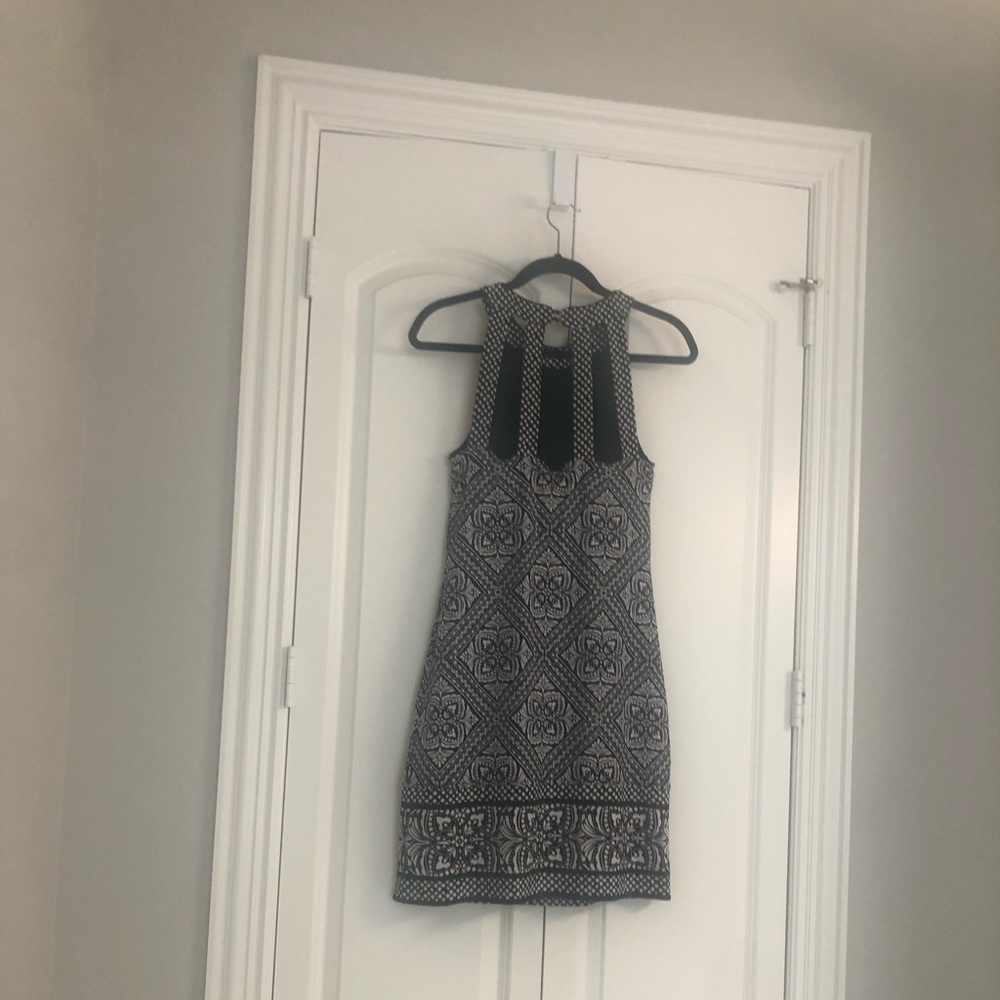 Casual dress. Reversible. Solid one side with trim. Reverse to pattern side